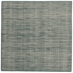 Sample of the Moire Rug in Sea Breeze, a subtle striated pattern in teal and off white. 