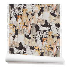 Partially unrolled wallpaper with a pattern of many different types of illustrated watercolor dogs. Background is black.