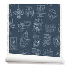 Partially unrolled wallpaper with white hand-drawn illustrations of New York City landmarks on a navy background.