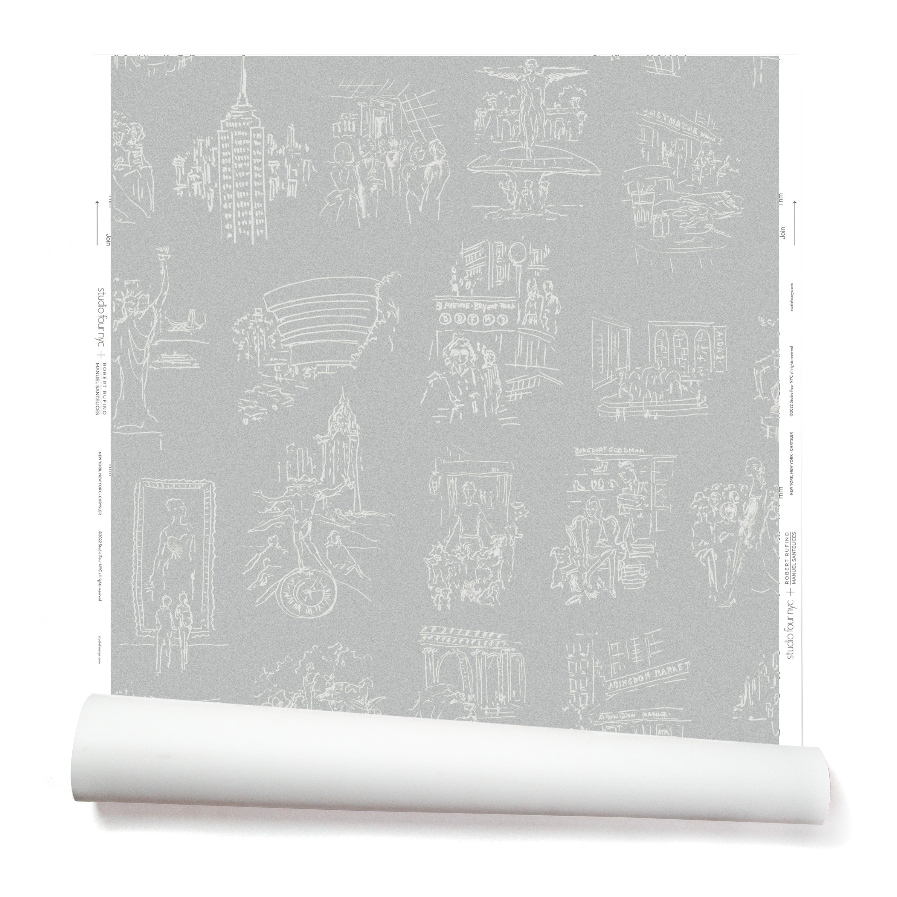 Partially unrolled wallpaper with white hand-drawn illustrations of New York City landmarks on a gray background.