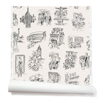 Partially unrolled wallpaper with black hand-drawn illustrations of New York City landmarks on a white background.