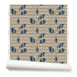 Wallpaper roll with a complex cornflower and dark blue striped floral motif overlayed a white and tan plaid pattern. 