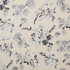 Linen swatch with a pattern of large-scale line-drawn flowers in black ink with gray watercolor, on a beige background.