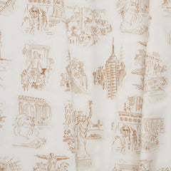Folded linen swatch with sepia tone hand-drawn illustrations of New York City landmarks on a beige background.