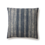 Square throw pillow in a striped pattern of intricate white lines over a washed navy background.