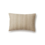 Rectangular throw pillow in a striped pattern of intricate white lines over a washed beige background.
