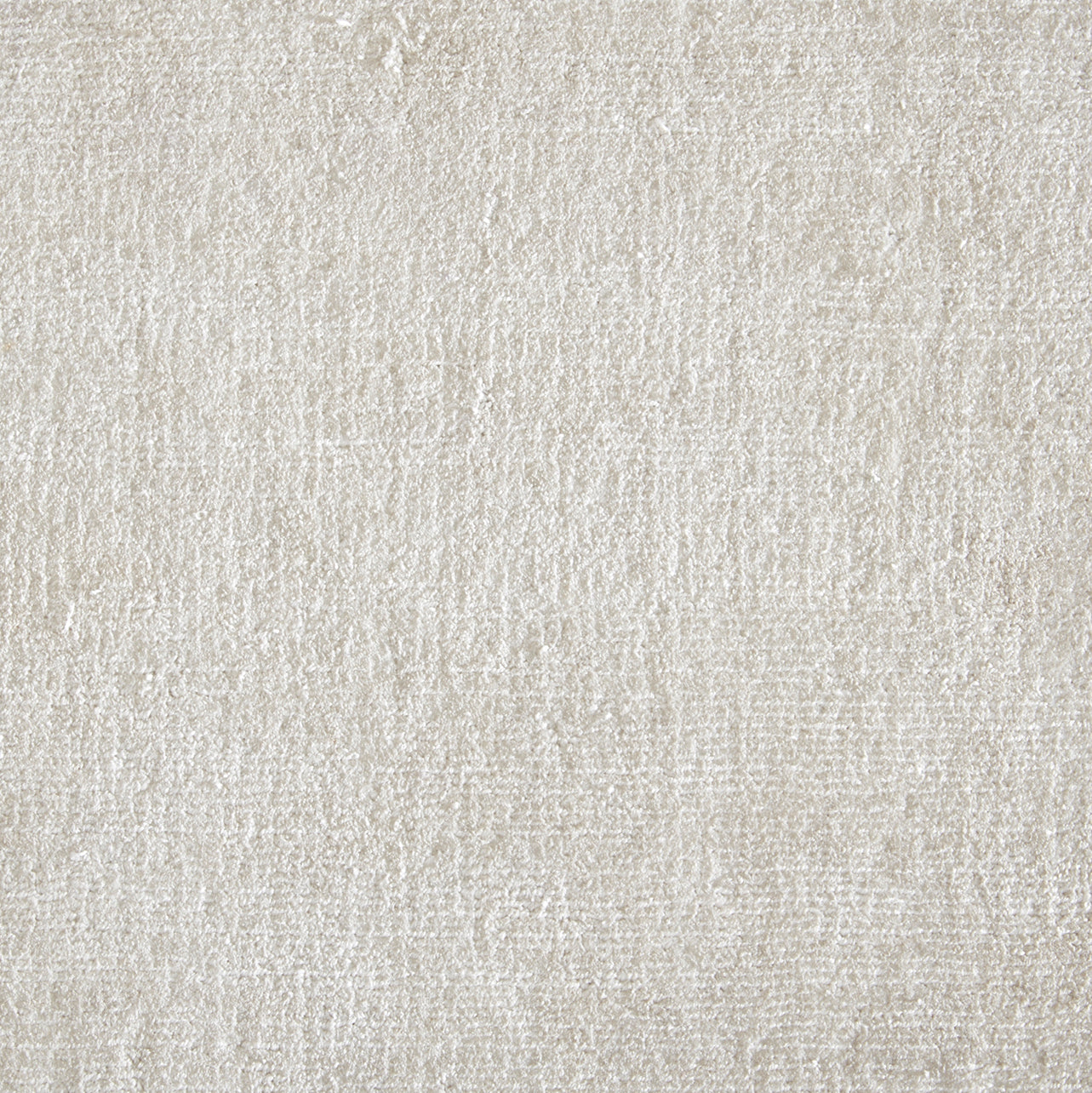 Poly-silk high pile broadloom carpet swatch in a shiny alabaster colorway.