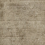 Poly-silk high pile broadloom carpet swatch in a shiny almond colorway.