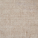 Poly-silk high pile broadloom carpet swatch in a shiny cream colorway.