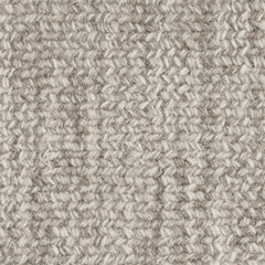 Wool broadloom carpet swatch in a chunky fiber weave mottled gray and cream.