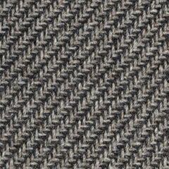 Wool broadloom carpet swatch in a high-pile diagonal stripe in mottled black and gray.