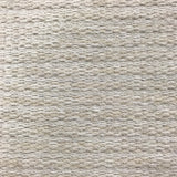 Wool broadloom carpet swatch in a large-scale weave texture in a mottled cream color.