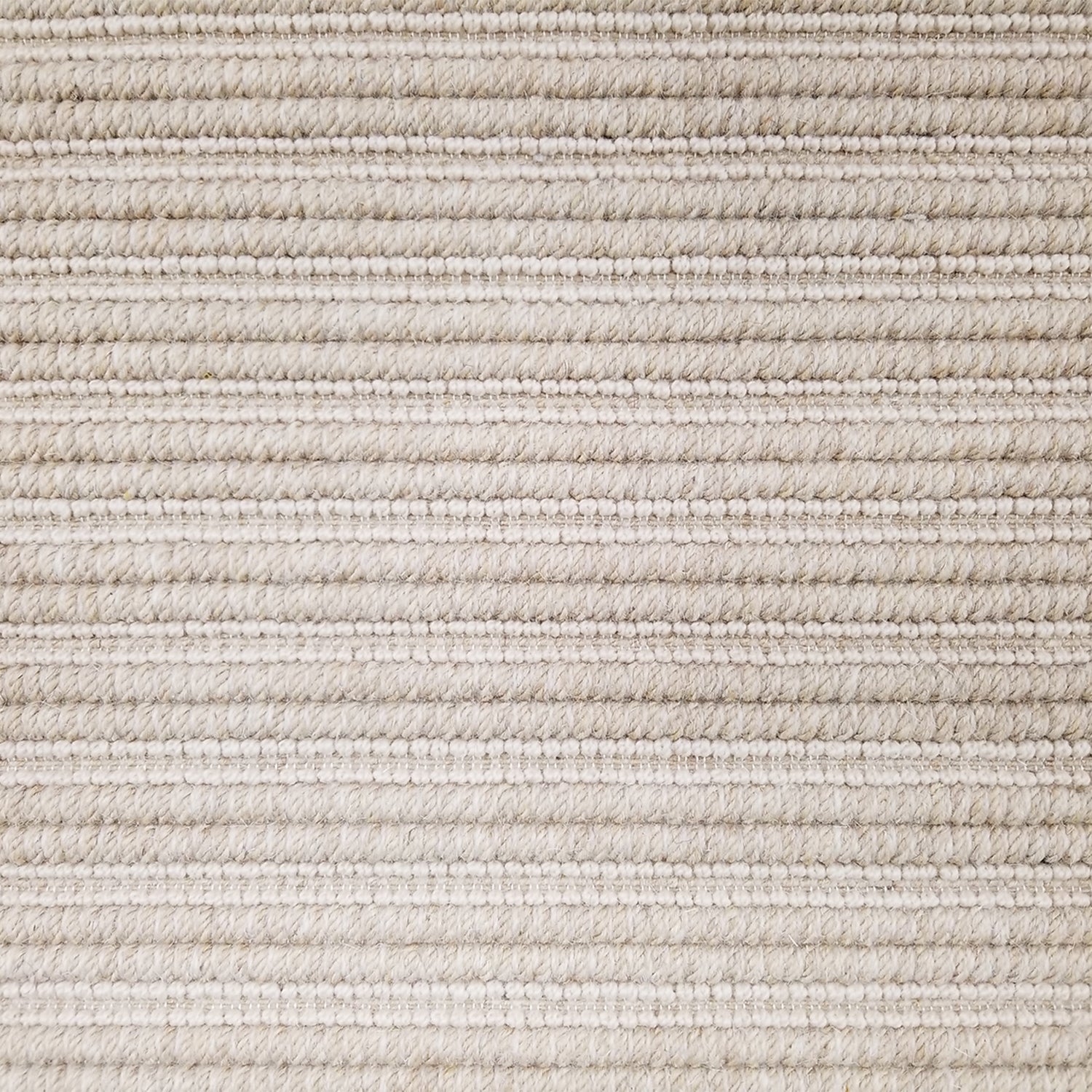 Wool broadloom carpet swatch in a textured stripe weave in a light camel colorway.