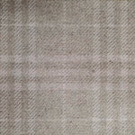 Wool broadloom carpet swatch in a subtle tan and cream plaid pattern.