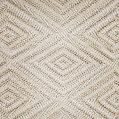 Wool broadloom carpet swatch woven in a dimensional diamond print in light gold.