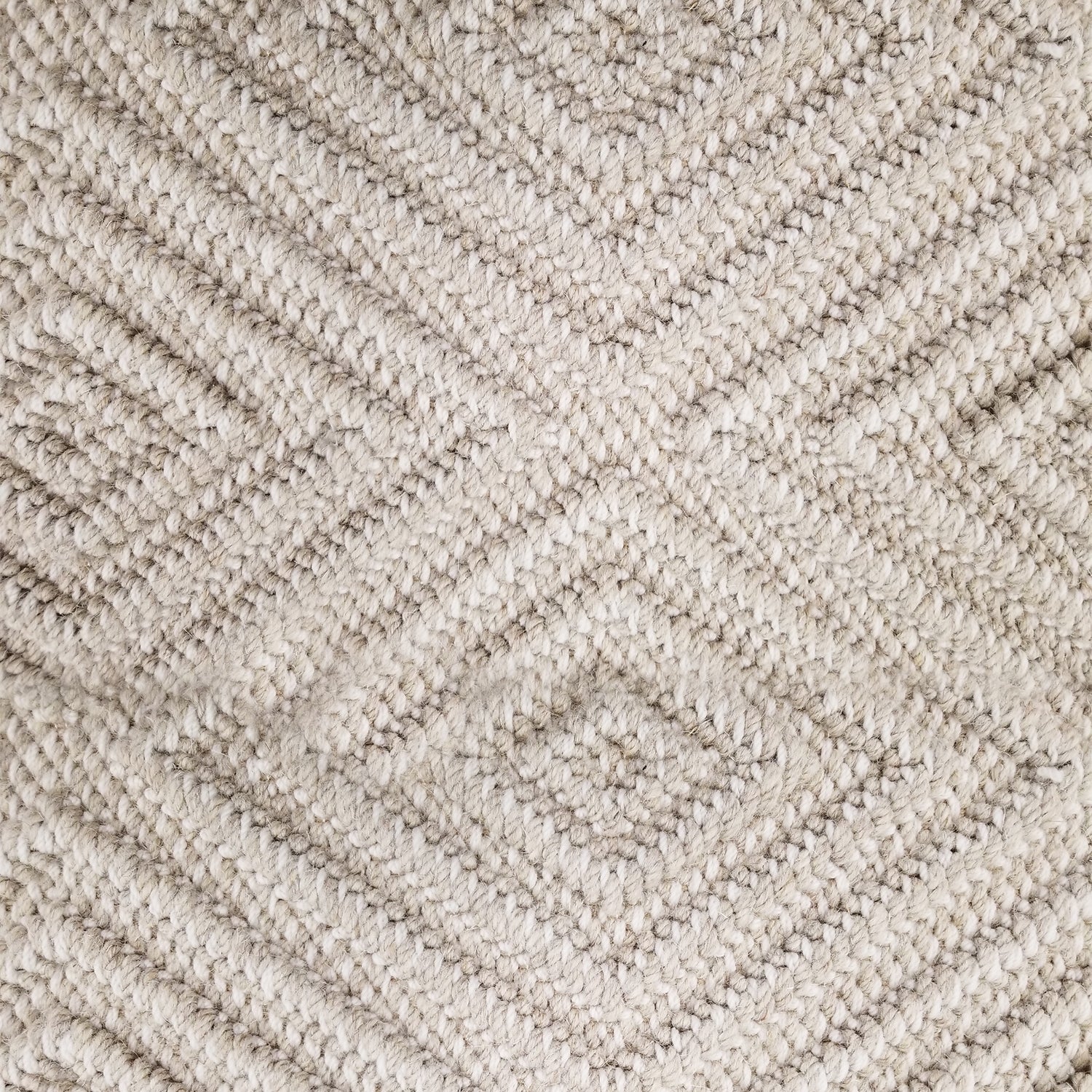 Wool broadloom carpet swatch woven in a dimensional diamond print in light silver.