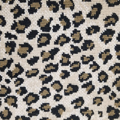 Wool broadloom carpet swatch in a leopard print in black and bronze on a cream field.