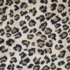 Wool broadloom carpet swatch in a leopard print in black and brown on a mottled cream field.