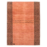 Rectangular high-pile rug in a dusty red with borders of a dense interlocking diamond pattern in black.