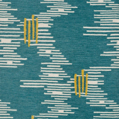 Detail of Carrier and Company Waterlilies Rug, white dashed lines on a turquoise ground with accents of yellow