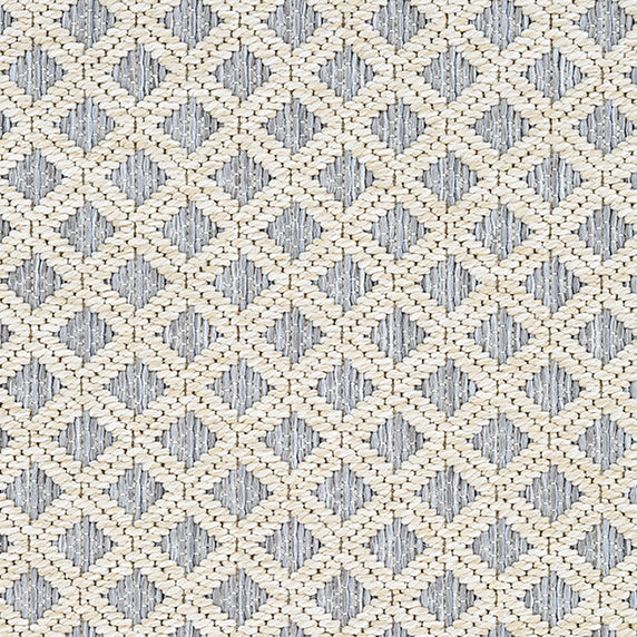 Outdoor broadloom carpet swatch in a woven diamond grid print in cream and blue-gray.