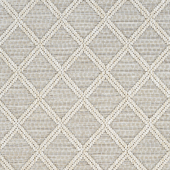 Outdoor broadloom carpet swatch in a geometric diamond weave in beige and tan.