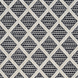 Outdoor broadloom carpet swatch in a geometric diamond weave in beige and charcoal.