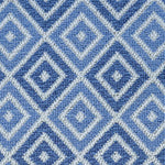 Wool broadloom carpet swatch in a geometric diamond weave in multicolor blue and white.