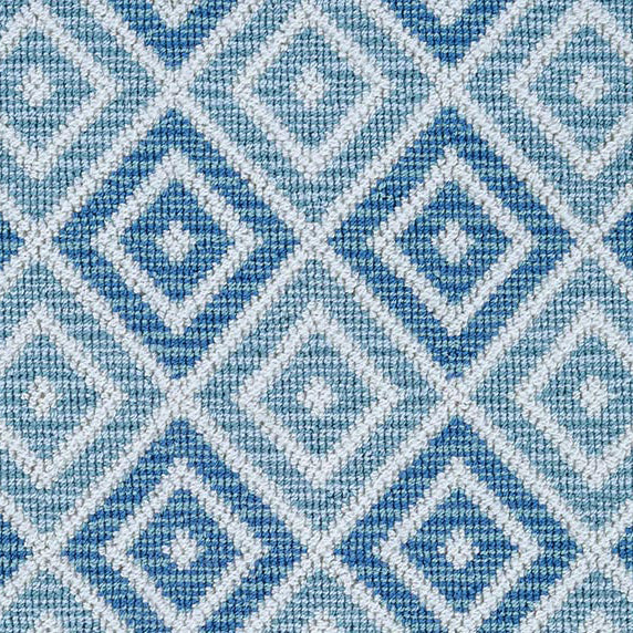 Wool broadloom carpet swatch in a geometric diamond weave in multicolor turquoise, blue and white.