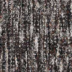 Wool-polyester broadloom carpet swatch in a multicolor white, brown and charcoal bouclé weave.