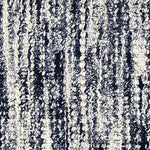 Wool-polyester broadloom carpet swatch in a multicolor cream, navy and charcoal.