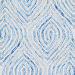 Wool broadloom carpet swatch in a painterly diamond pattern in white and blue.