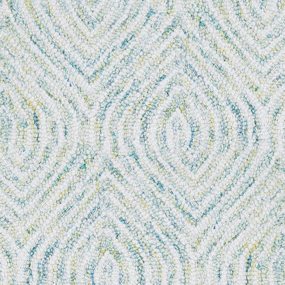 Wool broadloom carpet swatch in a painterly diamond pattern in white, light green and blue.