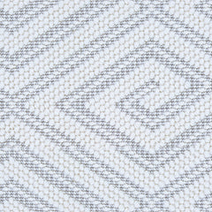 Wool broadloom carpet swatch in a geometric diamond weave in cream with light gray accents.