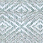 Wool broadloom carpet swatch in a woven geometric diamond print in teal and cream.