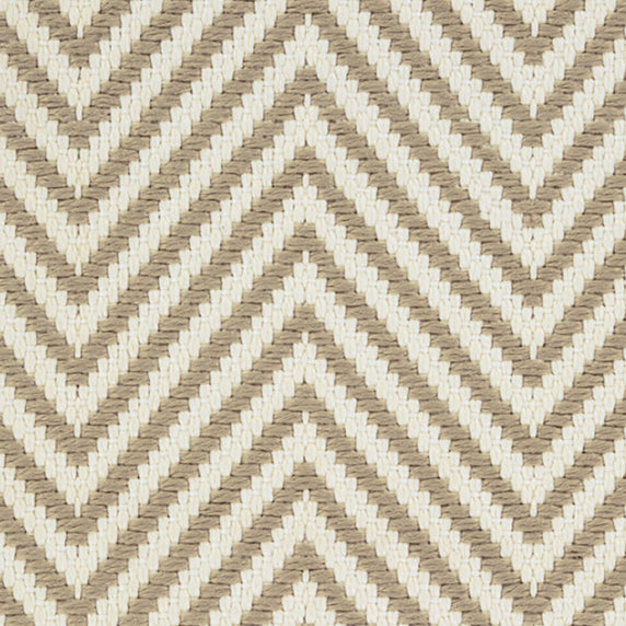 Outdoor broadloom carpet swatch in a herringbone weave in tan and cream.