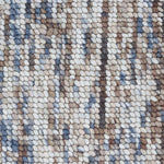 High-pile wool broadloom carpet swatch in a mottled cream, brown and blue colorway.
