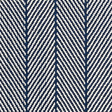 Outdoor broadloom carpet swatch in a striped herringbone weave in navy and white.