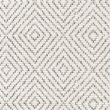 Wool broadloom carpet swatch in a graduated diamond print in dark gray on a cream field.