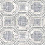 Wool broadloom carpet swatch in a repeating geometric grid weave in light gray-blue and cream.