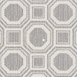 Wool broadloom carpet swatch in a repeating geometric grid weave in white and gray.