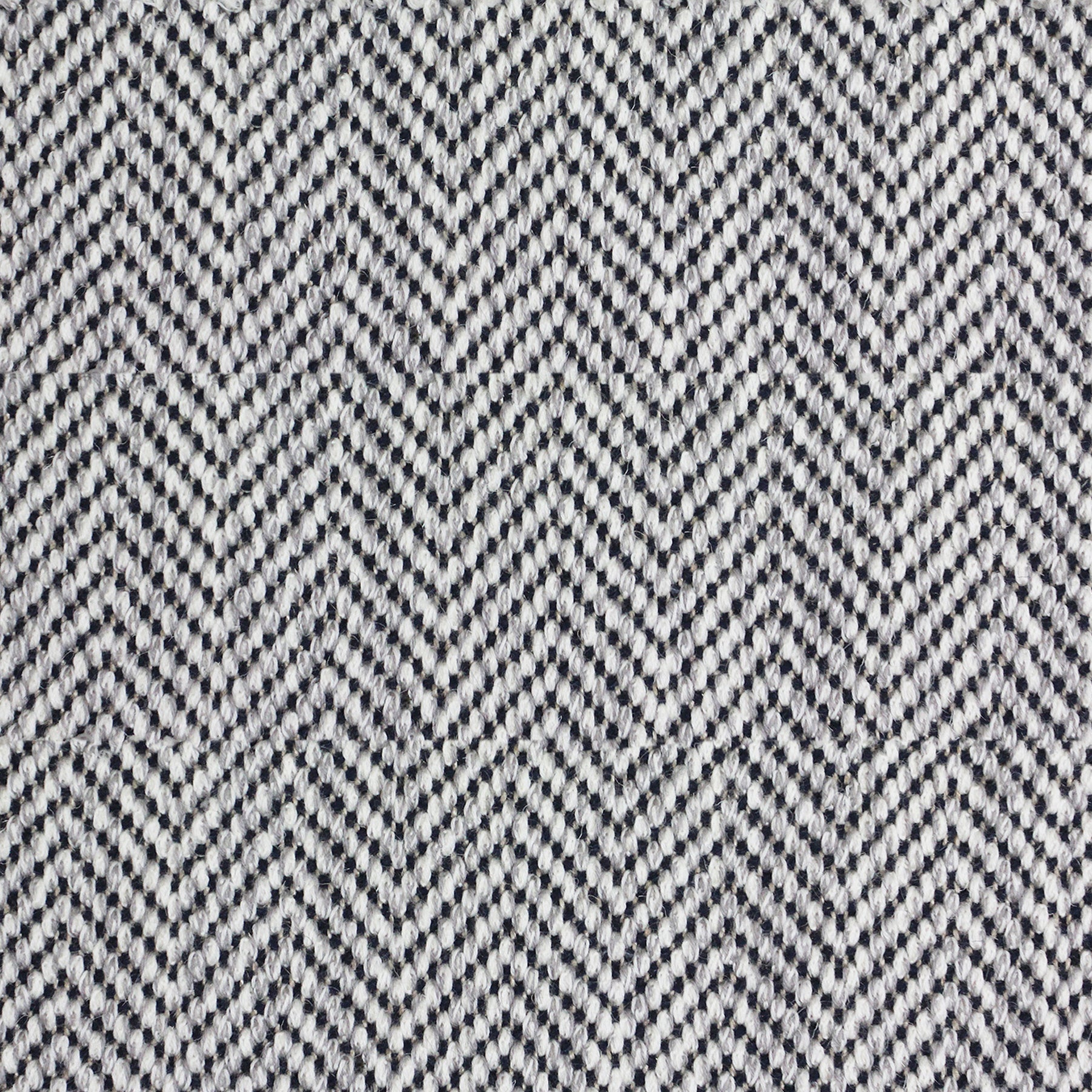 Wool broadloom carpet swatch in a herringbone weave in white and charcoal.