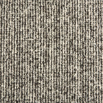 Wool broadloom carpet swatch in a textured high-pile weave in mottled white and charcoal.