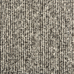 Wool broadloom carpet swatch in a textured high-pile weave in mottled white and charcoal.