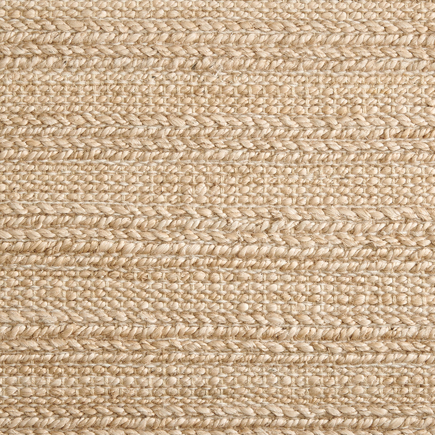 Jute broadloom carpet swatch in a flatweave in a tan shade.