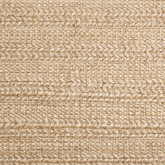 Jute broadloom carpet swatch in a flatweave in a tan shade.