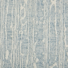 Wool-blend broadloom carpet swatch in a dimensional treetrunk weave pattern in light blue and cream.