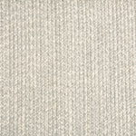 Outdoor broadloom carpet swatch in a chunky ribbed weave in mottled cream and gray.