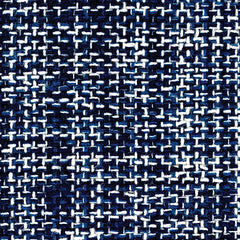 Wool broadloom carpet swatch in a tweed weave in mottled black, navy and white.
