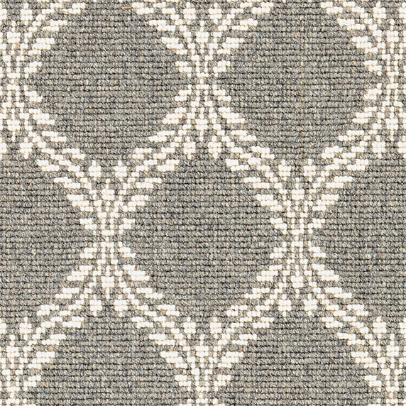 Wool broadloom carpet swatch in a leafy lattice print in white on a gray field.